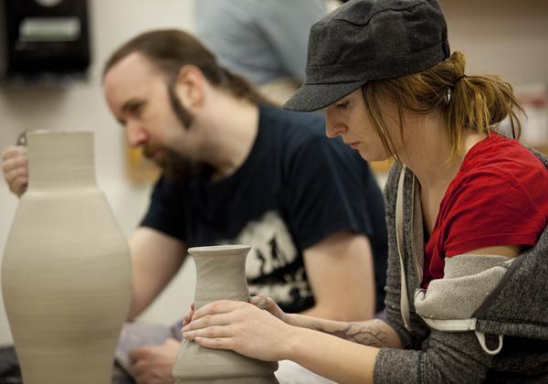 Visual Arts students attending a pottery class